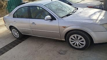 чолпон ата авто: Седан серебристого цвета. Кузов: 4 двери, классический трехобъёмный — 1