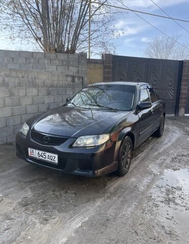 mazda 3: Mazda Protege: 2001 г., 2 л, Автомат, Газ, Седан — 2