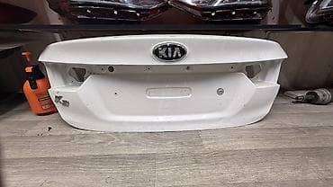 Крышка багажника Kia (седан), оригинальная. Особенности: - Заводская