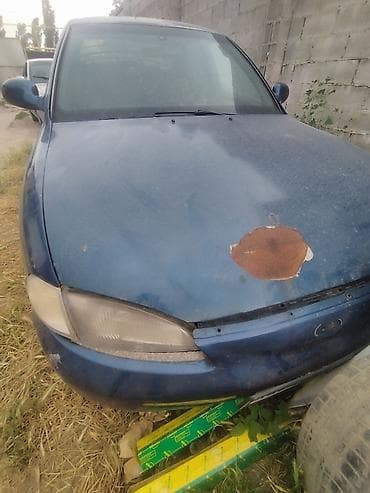 Литой автомобильный диск с шиной Хундай аванте 95 год продаю на — 5