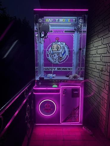 Игровой автомат “Happy Moment” — аппарат-качалка с захватом