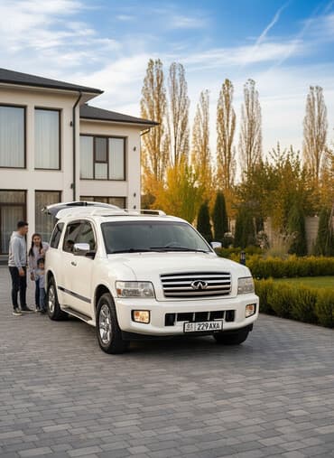 продаю связи с переездом: Infiniti QX56: 2005 г., 5.6 л, Автомат, Газ, Внедорожник — 1