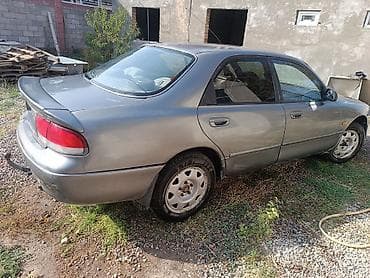bid e2: Mazda 323: 1992 г., 1.8 л, Ручные, Бензин, Седан — 4