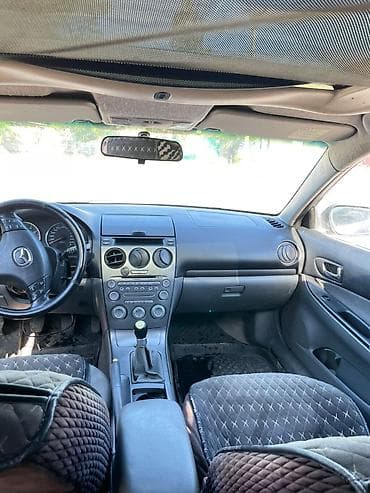 Унаа сатуу: Mazda 6: 2001 г., 2 л, Кол менен иштөөчү, Бензин, Седан — 7