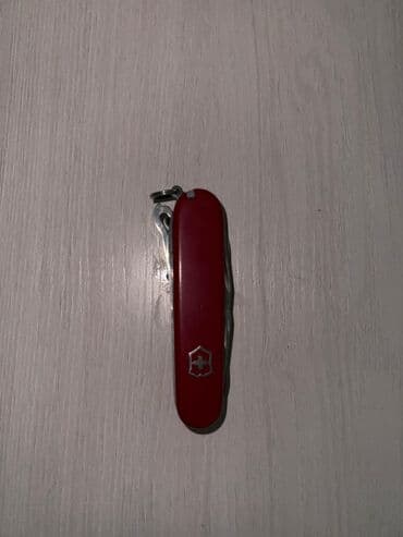 Музыкальные инструменты: Мультитулы и швейцарские ножи (набор) 1) Красный швейцарский нож — 7