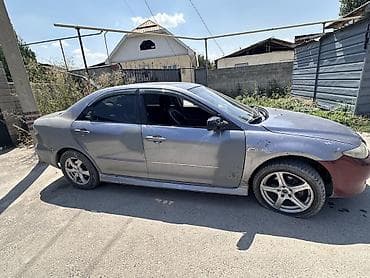 Транспорт: Mazda 6: 1999 г., 2 л, Механика, Бензин, Седан — 4