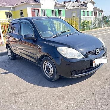 последующим: Mazda Demio: 2004 г., 1.5 л, Автомат, Бензин, Хэтчбэк — 3