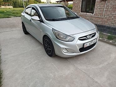 арзан матиз 1: Hyundai Solaris: 2012 г., 1.4 л, Кол менен иштөөчү, Бензин, Седан — 5