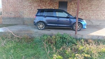 губа на гольф 2: Mazda Demio: 2004 г., Автомат, Хэтчбэк — 1