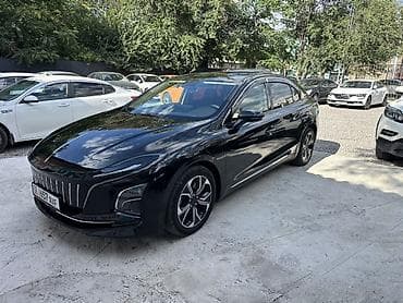 byd e9: Кожаный салон автомобиля с двухцветной отделкой (коричневый/черный) и — 3