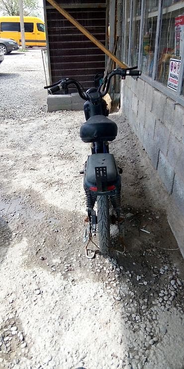 электрический мапед: Электроскутер (городской мини-скутер) - Компоновка: низкая широкая — 1