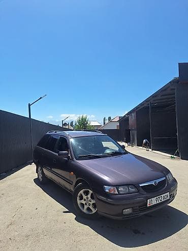 глушитель выхлоп: Mazda 626: 1999 г., 1.8 л, Механика, Бензин, Универсал — 4