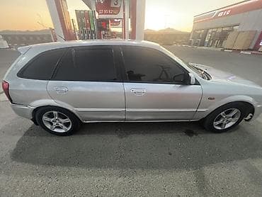 mini itx: Mazda Familia: 2003 г., 1.5 л, Механика, Бензин, Универсал — 4