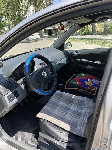 Продажа авто: Skoda Fabia: 2002 г., 1.4 л, Механика, Бензин, Седан — 6