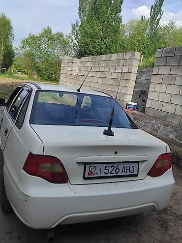 e50 amg: Daewoo Nexia: 2010 г., Бензин, Седан — 3