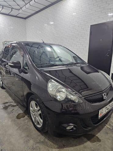 домкрат для автомобиля: Honda Jazz: 2007 г., 1.4 л, Вариатор, Бензин, Хетчбек — 6