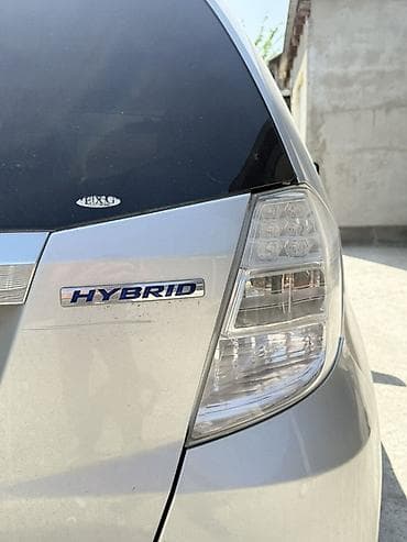 zimmer e9 pro: Honda Fit: 2011 г., 1.3 л, Вариатор, Гибрид, Хэтчбэк — 7