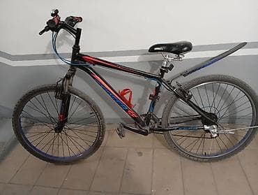 Горный велосипед с амортизационной вилкой и задним амортизатором