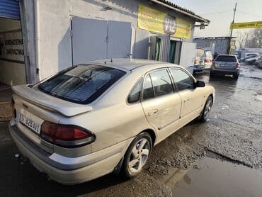 corolla runx: Mazda 626: 1999 г., 1.6 л, Автомат, Бензин, Седан — 10