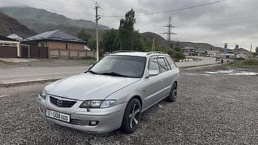 audi q4: Mazda 626: 2000 г., 2 л, Механика, Газ, Универсал — 1