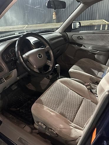 дмрв е34: Mazda Capella: 1999 г., Универсал — 7