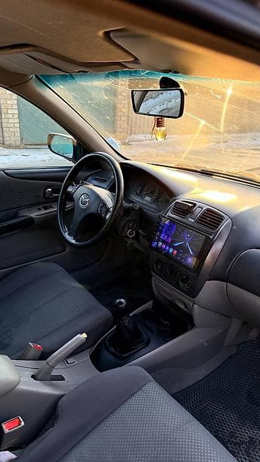 Mazda: Mazda 323: 2001 г., 1.6 л, Механика, Бензин, Универсал — 1