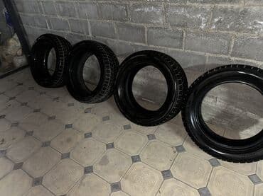 шинный: Шины 285 / 50 / R 20, Зима, Б/у, Комплект, Внедорожные (АТ/МТ), Япония, Dunlop — 2