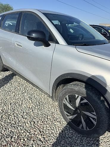 solutions elementary: Электромобиль кроссовер iO 05 (на эмблемах — «IO», шильдик «Q05») в — 2