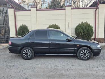 меняю доплатой мне: Mitsubishi Lancer: 1998 г., 1.8 л, Автомат, Бензиновая, Седан — 2
