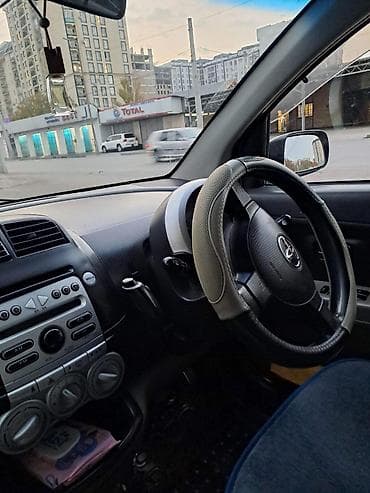 пирсеп машина: Toyota Passo: 2004 г., 1.3 л, Автомат, Бензин, Универсал — 5