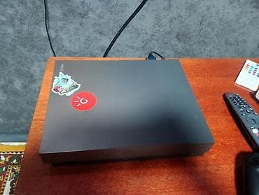 автомагнитола с двд: Игровая консоль Xbox One X (1 ТБ) с двумя беспроводными геймпадами — 4