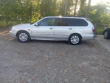 sorento 2017: Nissan Primera: 2000 г., Универсал — 10