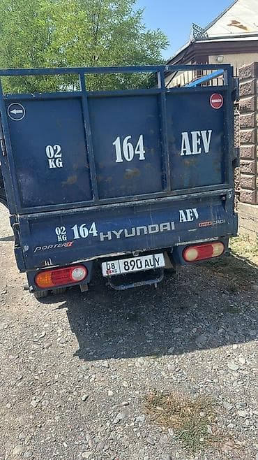 транс: Hyundai Porter II, синий бортовой малотоннажник - Тип: малый — 1