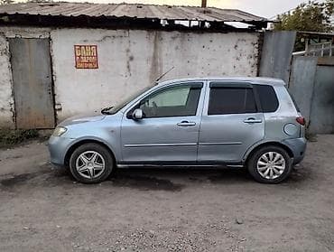 Mazda Demio: 2003 г. — 2