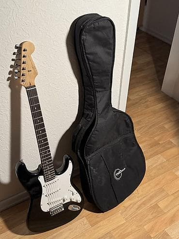 squier: Оригинальная Электрогитара Squier Stratocaster в классическом черном — 4