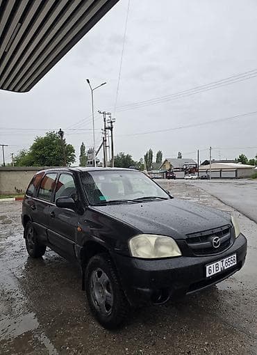 обмен транспорта: Mazda Tribute: 2001 г., 2 л, Механика, Газ, Внедорожник — 4