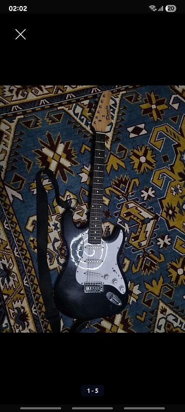 бу гитары: Китайская копия Fender, стратокастер. Состояние хорошее, струны — 7