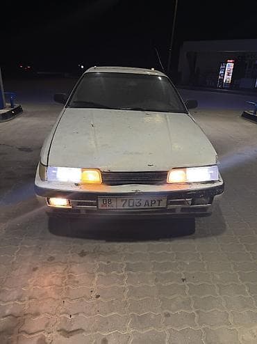 авто чанган: Mazda 626: 1991 г., 2.2 л, Кол менен иштөөчү, Бензин, Седан — 2