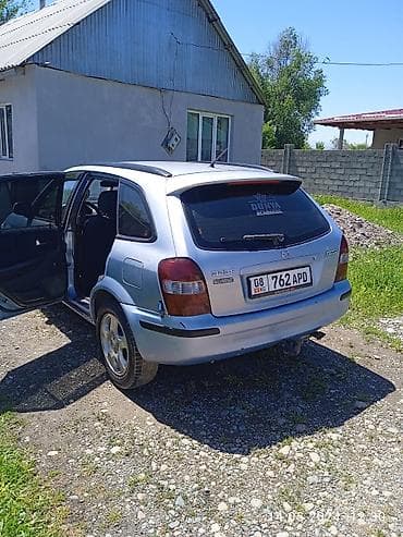 Транспорт: Mazda 323: 1999 г., Бензин, Универсал — 3