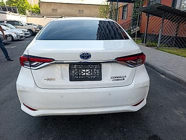 corolla 2004: Toyota Corolla: 2022 г., 1.8 л, Типтроник, Гибрид, Седан — 2