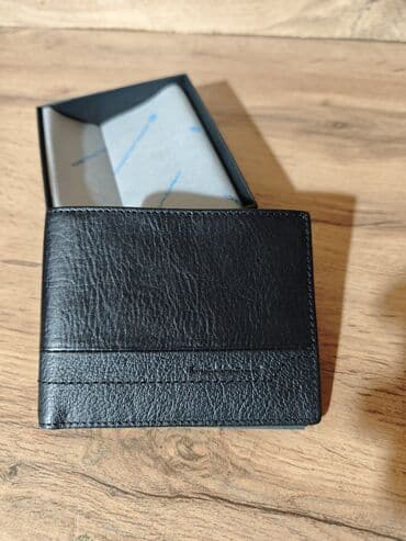 найден кошелек: Портмоне 
Натуральная кожа — 1