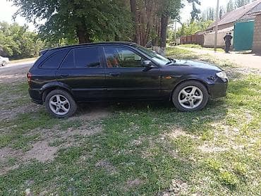 моторчик печки 124: Mazda 323: 2001 г., 2 л, Механика, Бензин, Хэтчбэк — 2