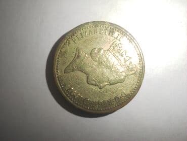 скупка коллекционных монет: Продаю монету номиналом 1 фунт 1997 года — 2