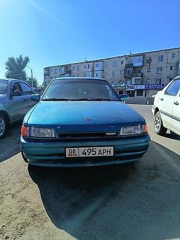 Транспорт: Mazda 323: 1991 г., 1.6 л, Механика, Бензин — 5