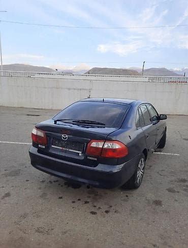3 ряд gx: Mazda 626: 2000 г., 1.8 л, Механика, Бензин, Седан — 4