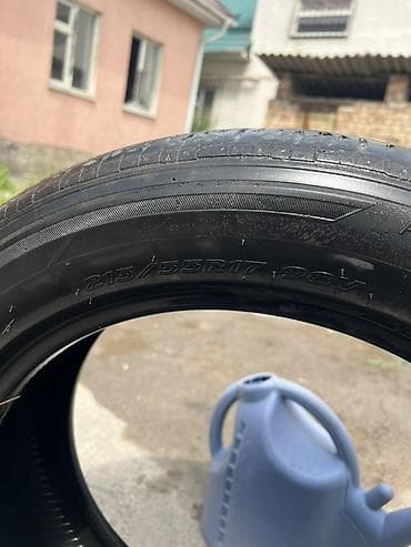 55: Комплект автомобильных шин R17. - Размеры на боковине: 215/55 R17 98V — 1