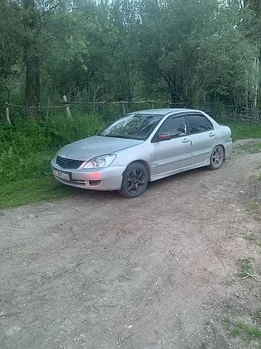 аудио системы: Mitsubishi Lancer: 2006 г., 1.6 л, Механика, Бензин, Седан — 1