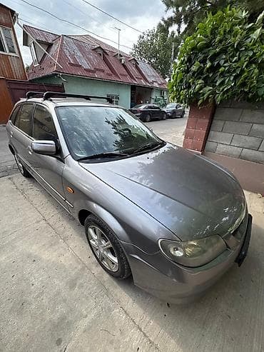 infinity fx35: Mazda 323: 2003 г., 1.6 л, Автомат, Бензин, Универсал — 5