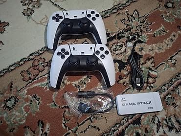 детские приставки nintendo switch: Игровая приставка Game Stick Pro (4K) с двумя беспроводными геймпадами — 4