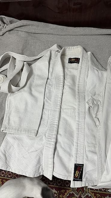 Кимоно для единоборств Cooper Martial Arts Комплектация: - Куртка из